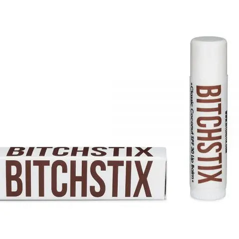 Bitchstix lip balm and packaging on a white background